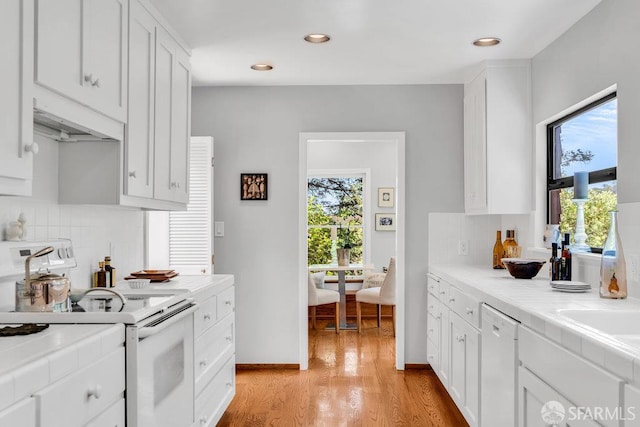 35 Ardilla Rd, Orinda, CA 94563 - kitchen featuring white appliances, tile countertops, white cabinets, and recessed lighting