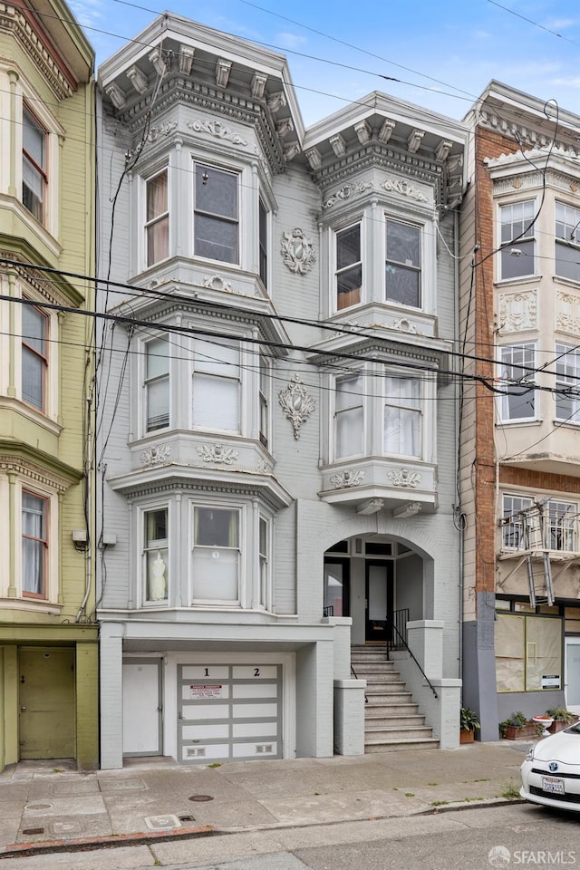 531-535 Frederick St, San Francisco, CA 94117 - view of front of property featuring a garage