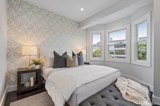 bedroom with hardwood / wood-style floors