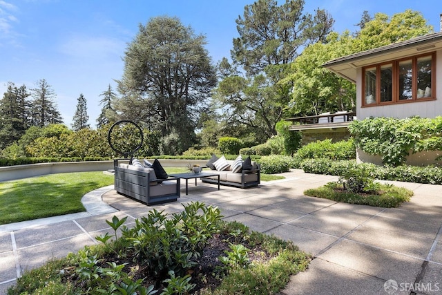 view of home's community with a patio and outdoor lounge area