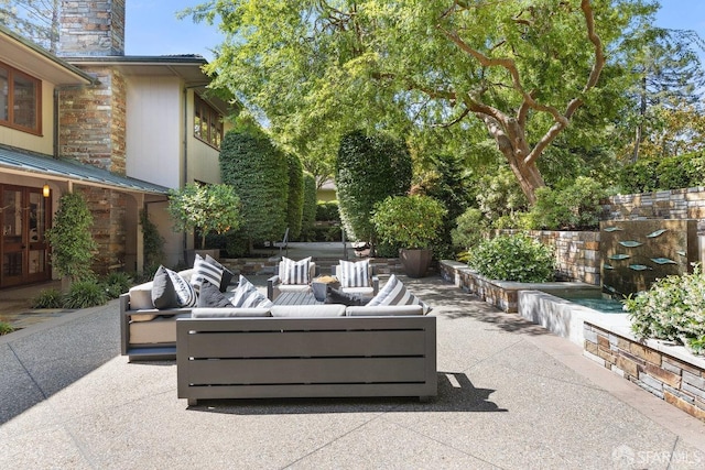 view of patio / terrace with french doors and an outdoor hangout area
