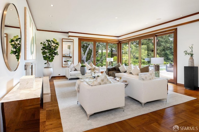 living area with ornamental molding and recessed lighting