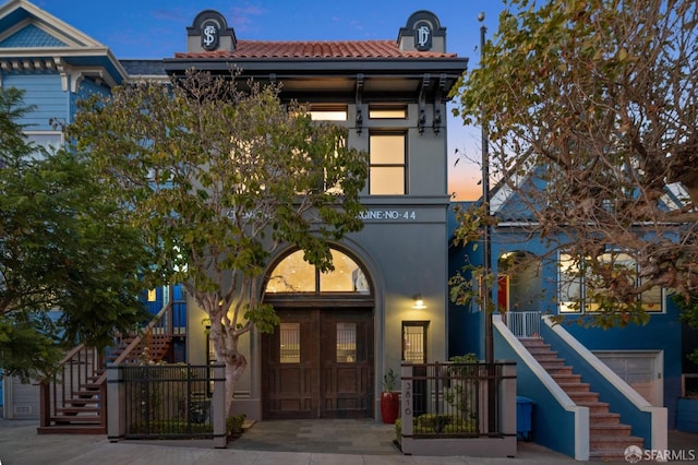 view of front of property with a garage