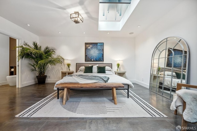 bedroom featuring a skylight