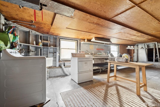 basement featuring separate washer and dryer