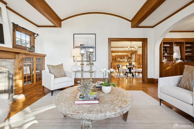 living room with parquet floors and a chandelier