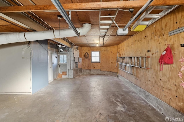 basement with wood walls