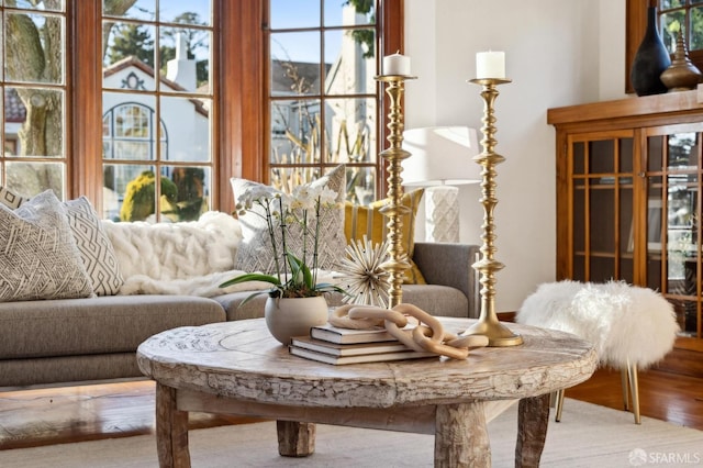 living area with hardwood / wood-style floors