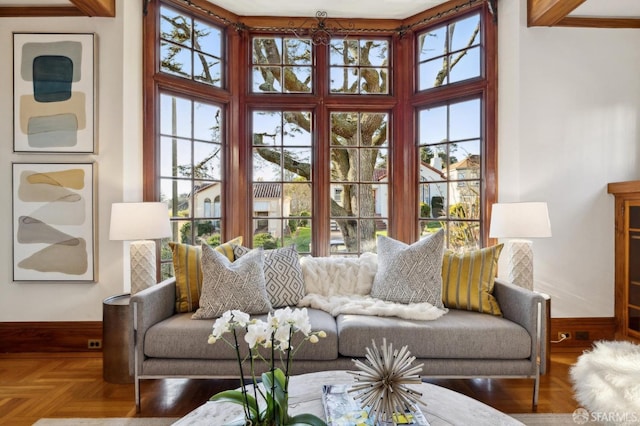 living room featuring parquet flooring and beamed ceiling