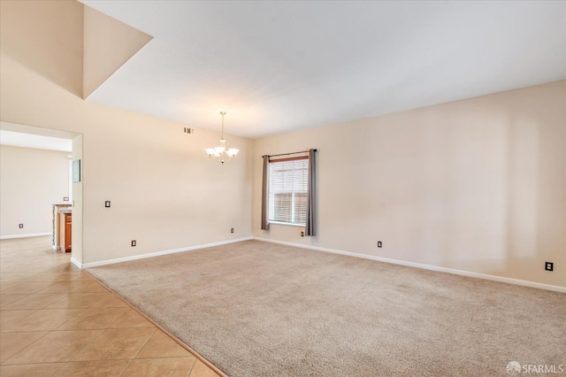 3642 Mallard Way, Antioch, CA 94509 - spare room with visible vents, light tile patterned floors, baseboards, light colored carpet, and a notable chandelier