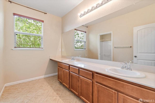 3642 Mallard Way, Antioch, CA 94509 - bathroom featuring tile patterned flooring, baseboards, a sink, and double vanity