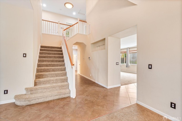 3642 Mallard Way, Antioch, CA 94509 - stairway featuring recessed lighting, a high ceiling, tile patterned floors, arched walkways, and baseboards