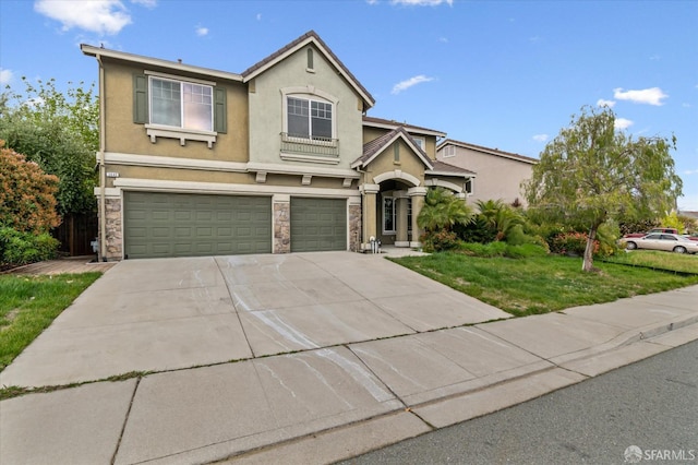 3642 Mallard Way, Antioch, CA 94509 - traditional home featuring driveway, stone siding, an attached garage, a front yard, and stucco siding
