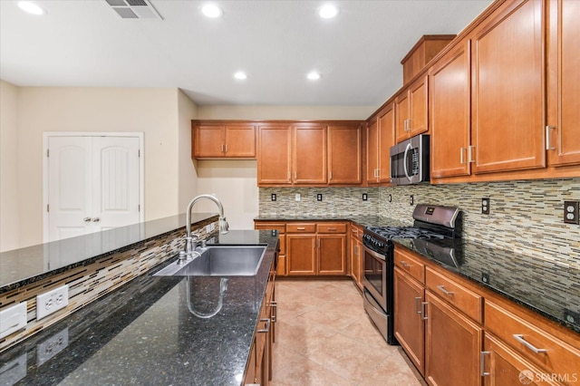 3642 Mallard Way, Antioch, CA 94509 - kitchen featuring brown cabinetry, visible vents, stainless steel appliances, and a sink