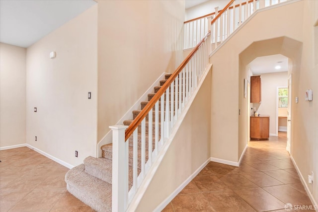 3642 Mallard Way, Antioch, CA 94509 - stairway with tile patterned floors, baseboards, and arched walkways