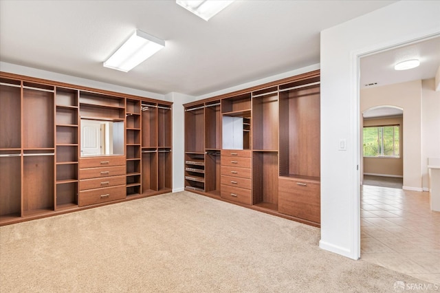 3642 Mallard Way, Antioch, CA 94509 - spacious closet with light colored carpet, arched walkways, and light tile patterned floors