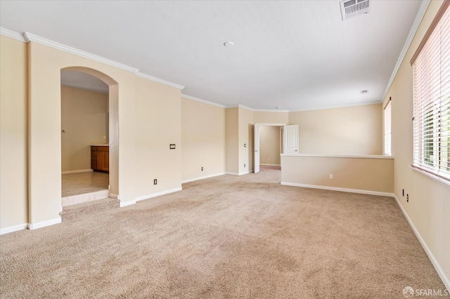 3642 Mallard Way, Antioch, CA 94509 - unfurnished room with visible vents, arched walkways, light colored carpet, and crown molding