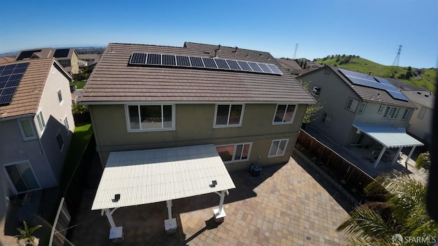 3642 Mallard Way, Antioch, CA 94509 - rear view of house featuring stucco siding and solar panels