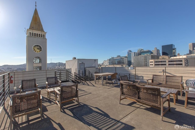 view of patio / terrace with outdoor lounge area and a mountain view