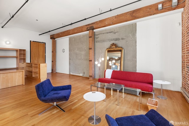 living room featuring hardwood / wood-style floors and a baseboard radiator