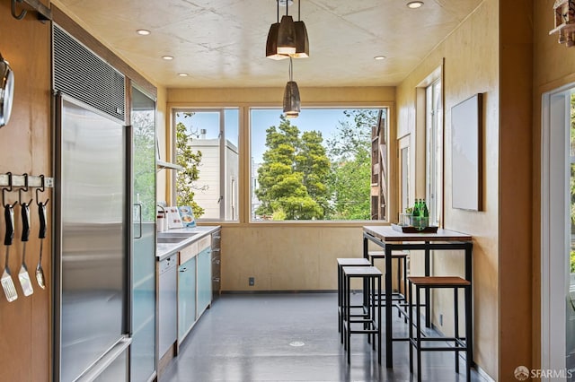 sunroom featuring sink