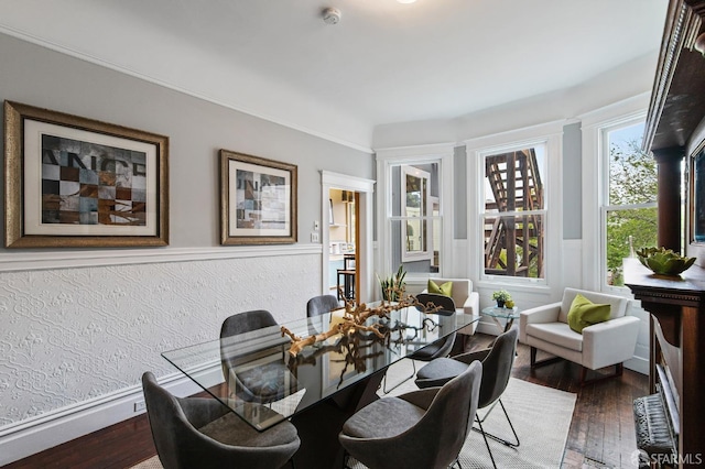 dining space featuring dark hardwood / wood-style flooring