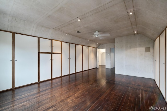 unfurnished room with ceiling fan and dark wood-type flooring