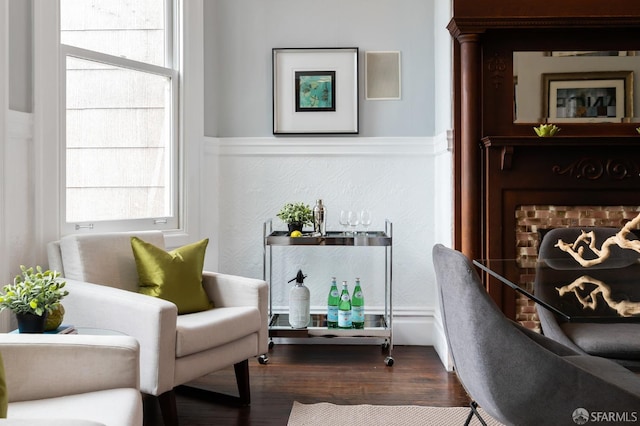 sitting room featuring hardwood / wood-style flooring