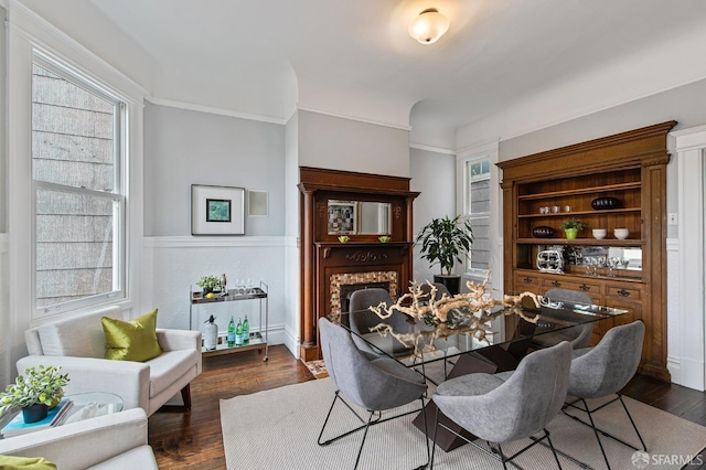 dining space featuring dark hardwood / wood-style floors