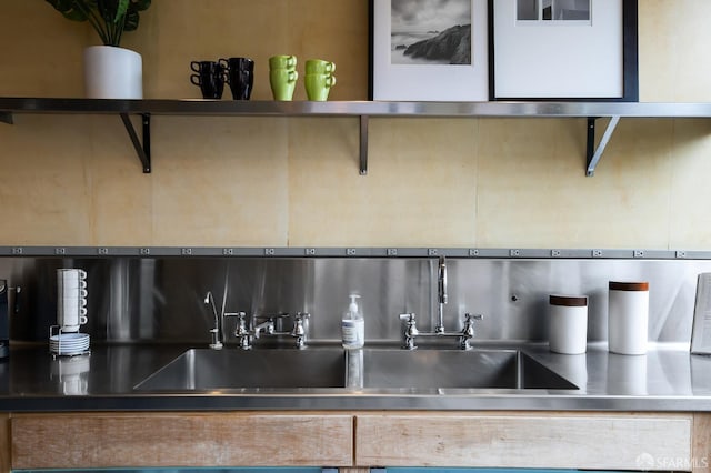 room details with backsplash and sink