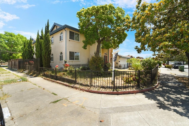 4600 Nelson St, Fremont, CA 94538 - view of front of home featuring stucco siding and a fenced front yard