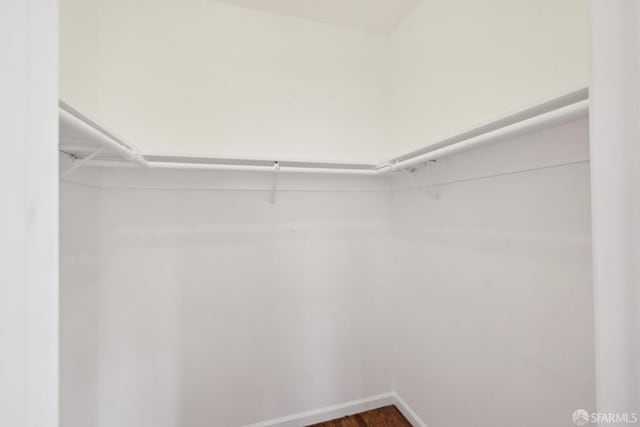302 Warren Dr, San Francisco, CA 94131 - spacious closet with dark wood-type flooring
