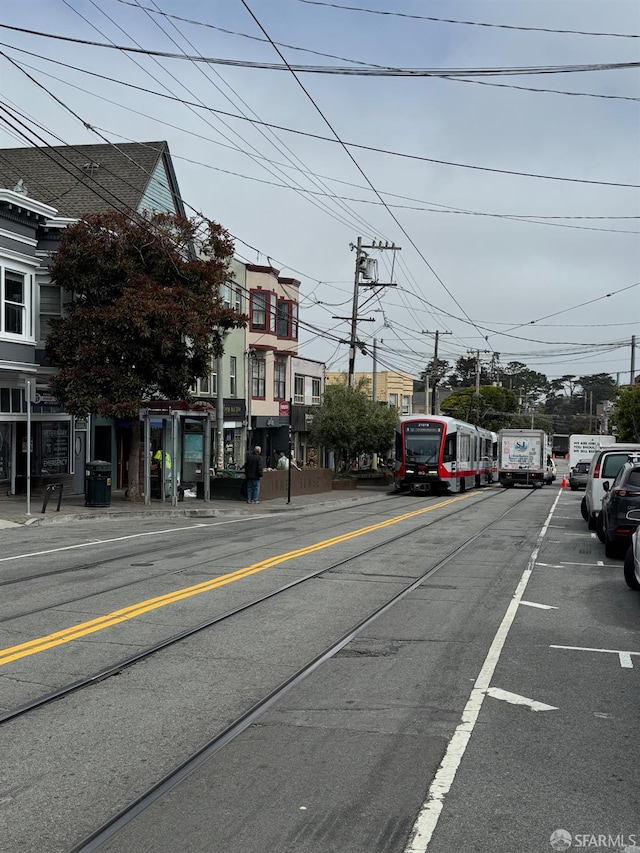 302 Warren Dr, San Francisco, CA 94131 - view of asphalt road with street lighting and sidewalks