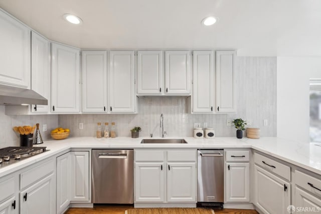 302 Warren Dr, San Francisco, CA 94131 - kitchen with appliances with stainless steel finishes, white cabinetry, light countertops, decorative backsplash, and recessed lighting
