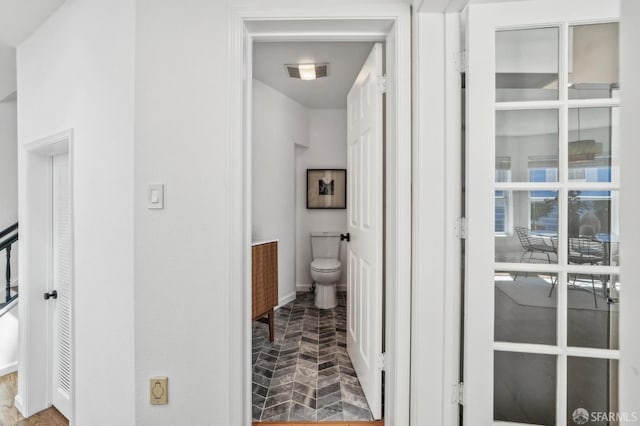 302 Warren Dr, San Francisco, CA 94131 - hallway featuring brick floors and baseboards