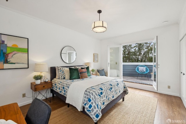 302 Warren Dr, San Francisco, CA 94131 - bedroom featuring access to outside, crown molding, and wood finished floors