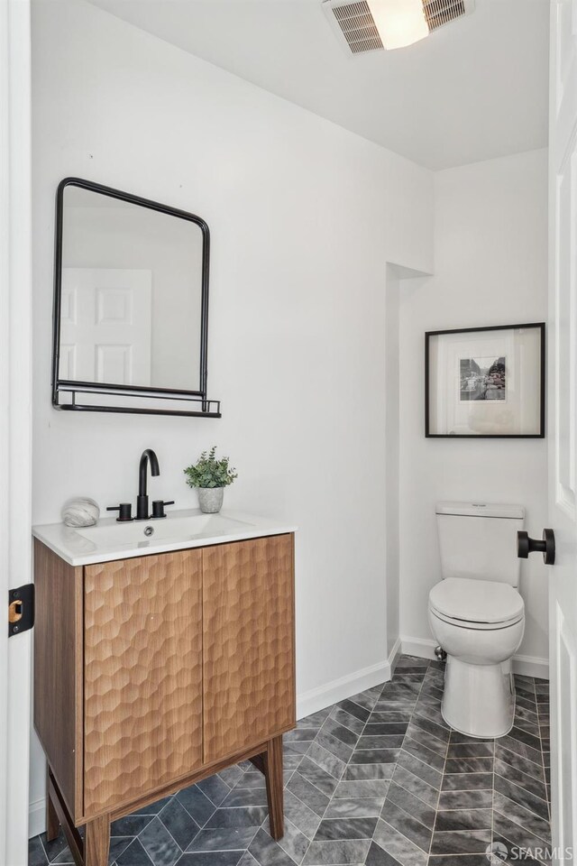 302 Warren Dr, San Francisco, CA 94131 - bathroom with toilet and vanity