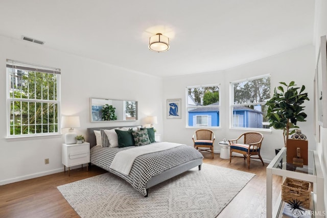 302 Warren Dr, San Francisco, CA 94131 - bedroom featuring wood finished floors and crown molding