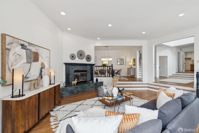 302 Warren Dr, San Francisco, CA 94131 - living area with wood finished floors, recessed lighting, and a high end fireplace