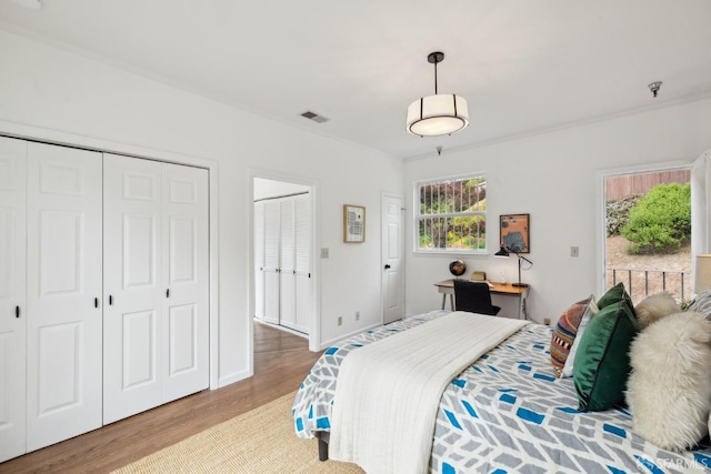 302 Warren Dr, San Francisco, CA 94131 - bedroom featuring light wood-style flooring and multiple windows