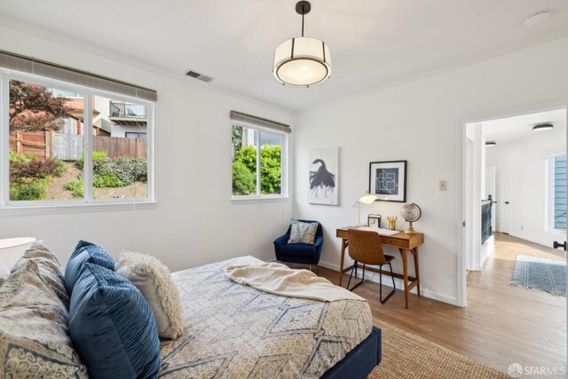 302 Warren Dr, San Francisco, CA 94131 - bedroom with wood finished floors and ornamental molding
