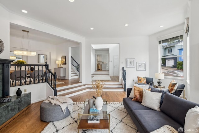 302 Warren Dr, San Francisco, CA 94131 - living room featuring wood finished floors, stairs, recessed lighting, and a chandelier