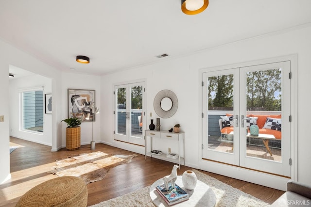 302 Warren Dr, San Francisco, CA 94131 - living area with french doors, wood finished floors, and ornamental molding