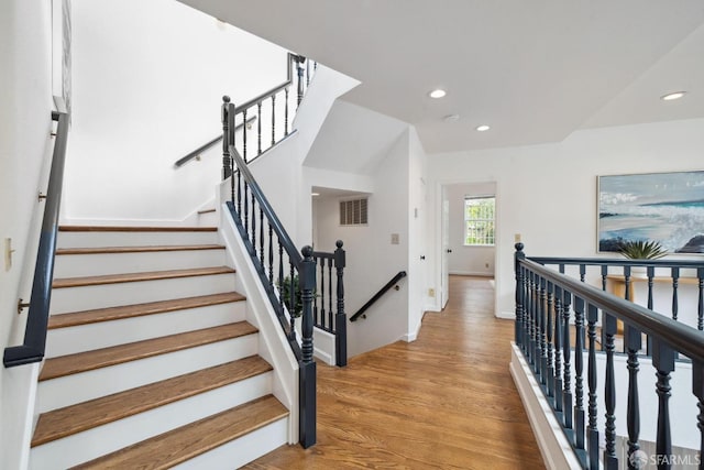 302 Warren Dr, San Francisco, CA 94131 - stairway featuring recessed lighting and wood finished floors