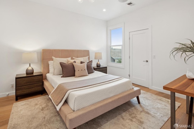 bedroom featuring light wood-type flooring