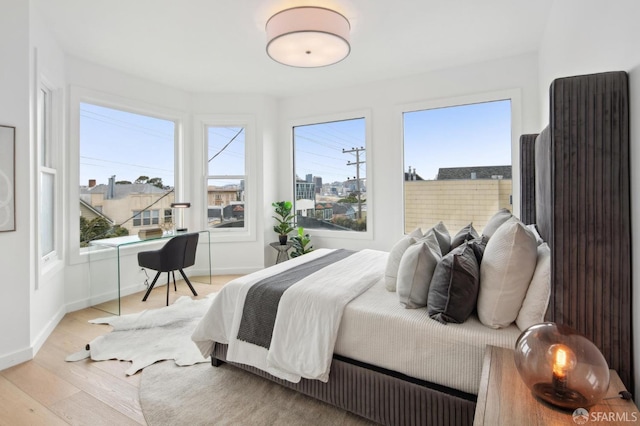 bedroom featuring light hardwood / wood-style flooring