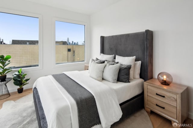 bedroom featuring light hardwood / wood-style floors