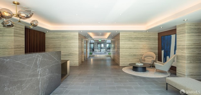 reception area featuring a notable chandelier