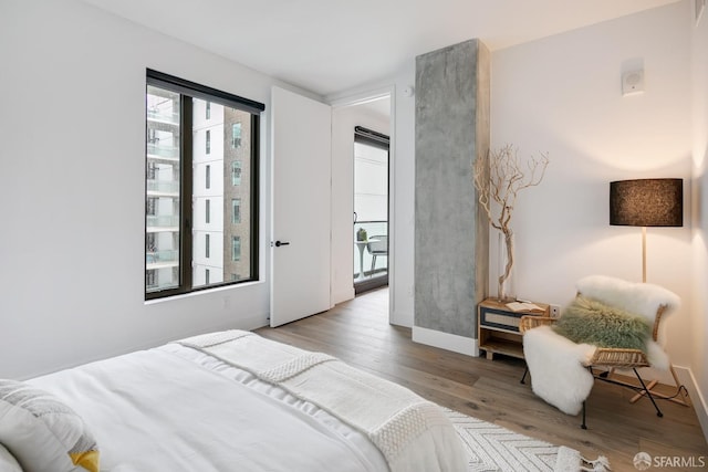 bedroom with light hardwood / wood-style flooring