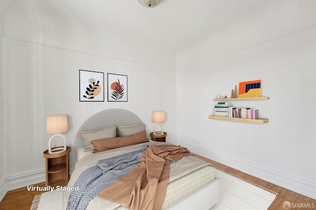 1527 Palou Ave, San Francisco, CA 94124 - bedroom with baseboards and wood finished floors